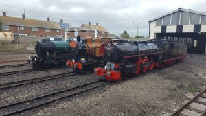 Southern Maid, The Bug & Black Prince wearing headboards commemorating 90 years of the RH&DR at New Romney July 2017